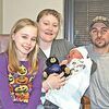 Pamela and Phillip Coker of Cawood, Ky., with newborn son Hunter David Coker, one of Wellmont Lonesome Pine Hospital's blizzard babies, and daughter Cassidy. PHOTO BY GLENN GANNAWAY.Click Hereto order photo reprints