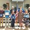 Six young writers recently received honors for their patriotic essays during a ceremony at Rejoice Learning Center in Castlewood. They are the 2020-21 winners from Mountain Empire Veterans of Foreign Wars Post 8652 in Coeburn, Keith Maggard VFW Post 4301 in Norton and John Fox Jr. VFW Post 5715 in Big Stone Gap. In the front row, left to right, are Melanie Holbrook, Ethan Owens, Christian Nunley, Caylee Jessee, Kellsie Brown, Madelyn Musick and Ida Lawson, VFW Post 8652 auxiliary president. In the back row are Anthony Willis, commander, Mountain Empire VFW Post 8652; David Jarvis, commander, Keith Maggard VFW Post 4301; and Joe Rasnick, commander, John Fox Jr. VFW Post 5715.  PROVIDED BY ANTHONY WILLIS