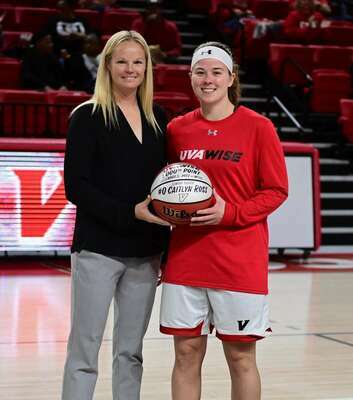 Caitlyn Ross shows she’s not a one-trick pony, becoming only the third player in UVA Wise women’s basketball history to score 1,000 points and serve up 500 assists. (Left: UVA Wise head coach Jamie Cluesman.) PHOTO BY RICHARD MEADE