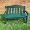 The forest green bench was presented to the city and has been located at Norton Community Center.