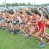 The girls’ teams blast off from the starting line.