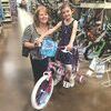 Amelia Schill is shown here with her new bike and Marsha Craiger , Emergency Services Director for MEOC.