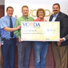 On hand for the combined ceremonial check presentation were, from left, Donald Purdie,  Appalachian Broadband Innovators; Michael Wampler, MEOC executive director; Jeff Gilliam, LENOWISCO Health District business manager; Reisa Sloce, LENOWISCO Health District director; Brian Falin, Wise County IDA executive director; and Jonathan Belcher, VCEDA executive director/general counsel.  VCEDA PHOTO
 