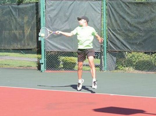 Hugo Retortillo shows off his skills in tennis action.
