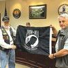 Ben Foy of Rolling Thunder Tennessee Chapter 4 presented this POW-MIA flag to Norton City Council Nov. 15 for installation on the city hall flagpole. Receiving it, at right, is Vice Mayor Mark Caruso. Foy, who has hosted a radio program on WLSD, is moving to Tennessee, according to City Manager Fred Ramey, and council thanked him for his community involvement.  CITY OF NORTON PHOTO