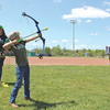 A young man shoots archery skeet during a late April archery tournament in Wise that attracted several hundred participants from several states.  KENNETH CROWSON PHOTO