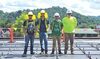Zack Phipps, Isaiah Meeks, Noah Mullins and Anthony Hamilton are installing solar power at St. Paul Elementary School.  KENNETH CROWSON PHOTO