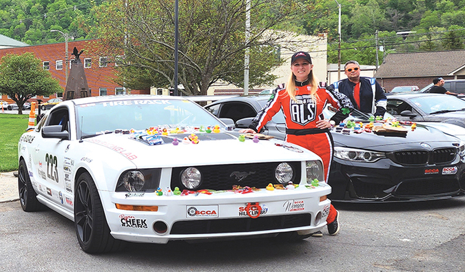 Queen of the Dragon Hillclimb and Sports Car Club of America 2020 Time Trials National Tour podium finisher Ryan Cheek with her 2006 Ford Mustang. PROVIDED BY RYAN CHEEK