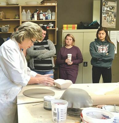 Professor Suzanne Adams-Ramsey and students in her Gallery Internship class are using their artistic skills to combat hunger.