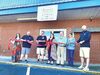 The Wise County Chamber of Commerce, St. Paul officials and others cut the ribbon May 10 to welcome Mini Cake Co. to town.  CHAMBER OF COMMERCE PHOTO