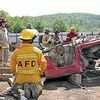 Firefighters from the Appalachia Volunteer Fire Department, which recently got extra financial help from Wise County, were on hand at a special vehicle extrication training session held Sunday in Coeburn. PHOTO BY JODI DEAL.Click Hereto order photo reprints
