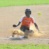 A’nyah Hollinger slides safely into third before stealing home on an errant throw Tuesday. PHOTO BY KELLEY PEARSON