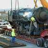 On January 18, 2016, the engine had arrived at Corbin after the long highway trip from Bainbridge, GA. Now the hard work of turning a rusting hulk into a museum piece was ready to begin. Many parts were removed for the haul from Georgia to meet vertical clearance limits and reduce weight. (Ron Flanary)