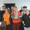 The John I. Burton High School robotics team was recognized at Norton School Board's Jan. 16 meeting. Left to right are John Flanary, Sophie Jones, Jack Sturgill, Kane Meade, Alex Mullikin, Preston McNew, Ian McCarroll, Addison McCarroll and coach Michael Brooke. Not pictured are captain Olivia Stidham, co-captain Joshua Peters, Kayleigh Sturgill, Zack Phipps and Lucas Lewis.  KENNETH CROWSON PHOTO