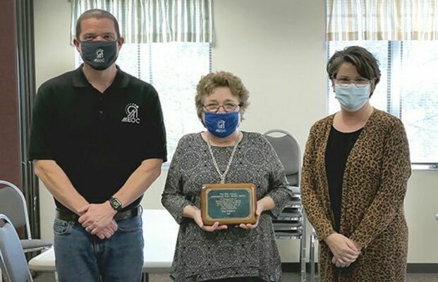 Irma Snodgrass (center) is the 2020 Mae French Outstanding Older Worker Award recipient. Mountain Empire Older Citizens presents the award annually. Snodgrass has worked for MEOC for 41 years. With her are MEOC Executive Director Michael Wampler and Older Worker Program Director Carrie Stallard.