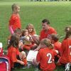 Dickenson County Youth Soccer League President and Coach Gary Rose takes a time out with his team, The Tigers, during a recent game. PHOTO BY MIRANDA MCCOY.Click Hereto order photo reprints