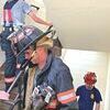 <p>Norton Fire Department members used the Regency Towers building to perform the memorial climb. About 20 residents cheered them on.</p>