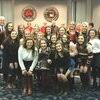 Central High School Competition Cheer Team pose with their trophy and school board members.Photo by Jenay Tate.